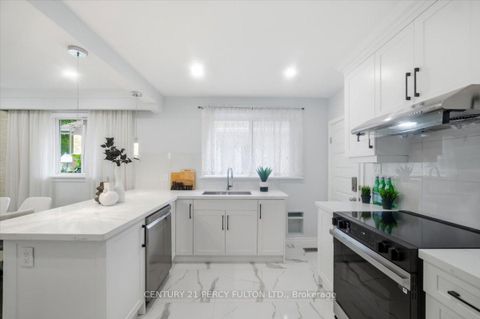 Photo 10 at 50 Mooregate Avenue, Ionview, Toronto