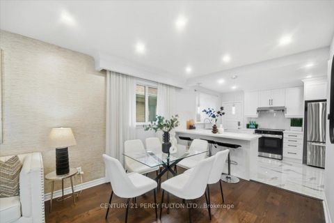 Photo 11 at 50 Mooregate Avenue, Ionview, Toronto