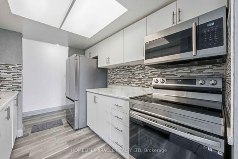Photo 12 at 405 - 5 Rowntree Road, Jamestown, Toronto