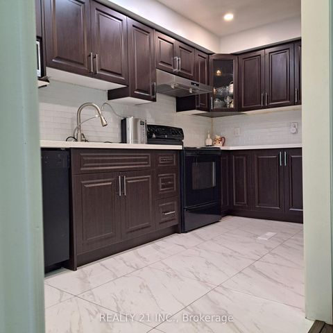Photo 4 at 55 Shepmore Terrace, Malvern, Toronto