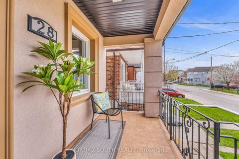 Photo 1 at 28 Teignmouth Avenue, Fairbank, Toronto