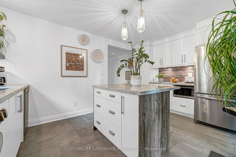 Photo 15 at 15 Denton Avenue, Crescent Town, Toronto