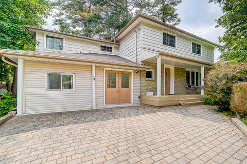 Photo 1 at 64 Gladys Road, Highland Creek, Toronto