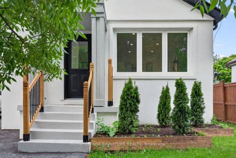 Photo 2 at 297 Kennedy Road, Cliffside, Toronto