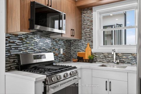 Photo 19 at 297 Kennedy Road, Cliffside, Toronto