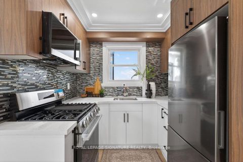 Photo 20 at 297 Kennedy Road, Cliffside, Toronto