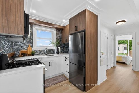 Photo 21 at 297 Kennedy Road, Cliffside, Toronto