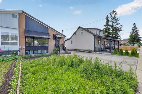 Photo 1 at 99 Laurel Avenue, Kennedy Park, Toronto