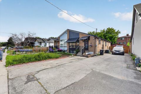 Photo 2 at 99 Laurel Avenue, Kennedy Park, Toronto