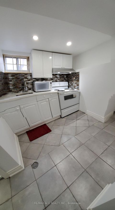 Photo 24 at 99 Laurel Avenue, Kennedy Park, Toronto