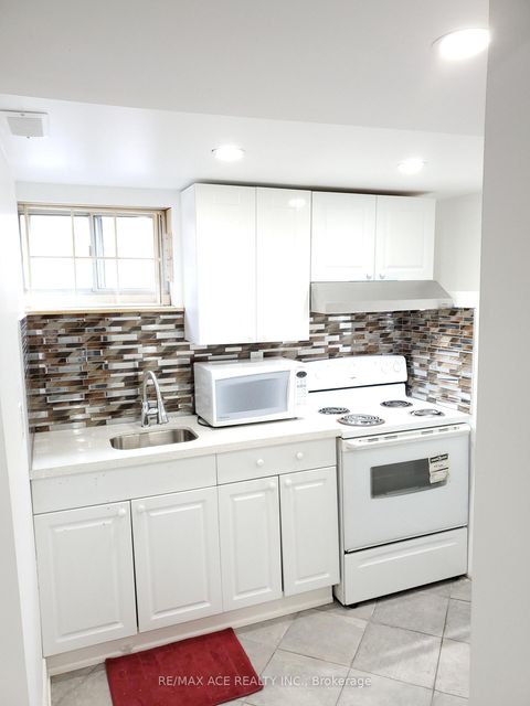 Photo 25 at 99 Laurel Avenue, Kennedy Park, Toronto