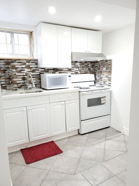 Photo 26 at 99 Laurel Avenue, Kennedy Park, Toronto
