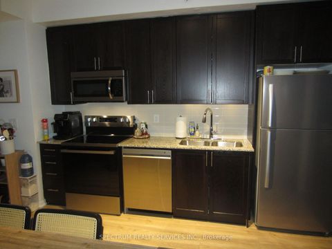 Photo 2 at 212 - 830 Lawrence Avenue, Glen Park, Toronto