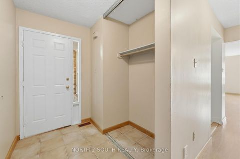 Photo 3 at 9 Millbank Court, Brownridge, Vaughan