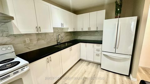 Photo 1 at 305 - 4064 Lawrence Avenue E, West Hill, Toronto