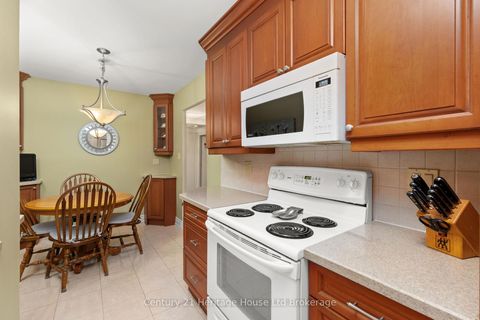 Photo 13 at 409 - 820 Burnhamthorpe Road, Markland Wood, Toronto