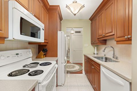 Photo 14 at 409 - 820 Burnhamthorpe Road, Markland Wood, Toronto