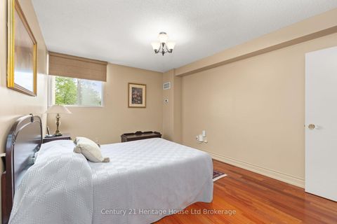 Photo 20 at 409 - 820 Burnhamthorpe Road, Markland Wood, Toronto