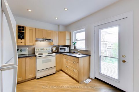 Photo 6 at 2102 Gerrard Street E, Danforth, Toronto
