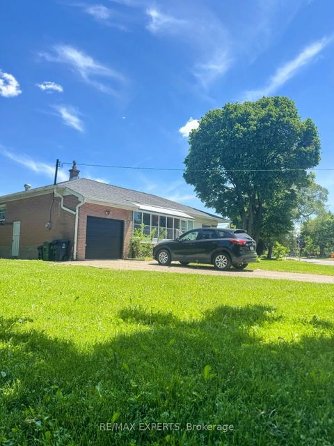 Photo 7 at 71 Lloyd Manor Road, Rosethorn, Toronto
