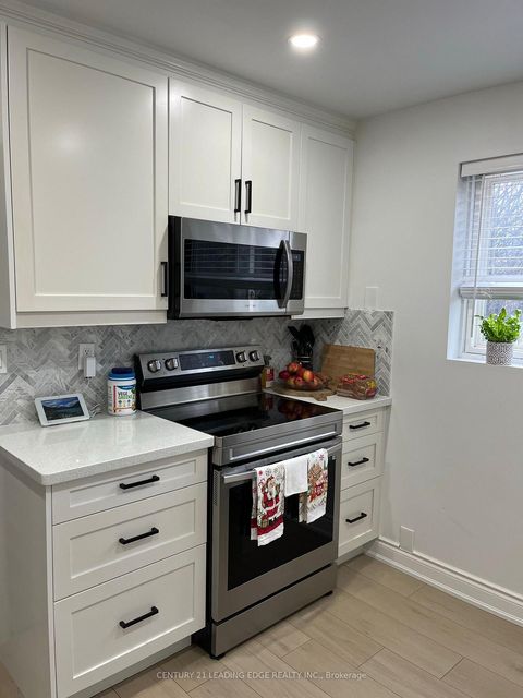 Photo 3 at 26 - 91 Muir Drive, Scarborough Village, Toronto