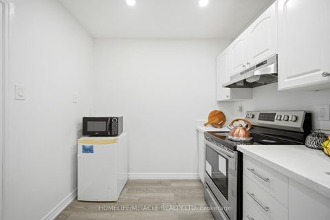 Photo 5 at 2051 - 100 Mornelle Court, Morningside, Toronto