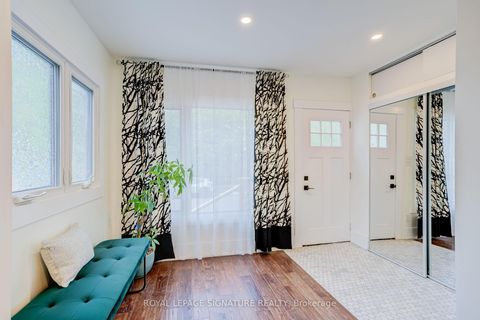 Photo 2 at 176 Barrington Avenue, Crescent Town, Toronto
