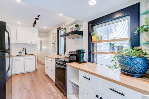 Photo 13 at 176 Barrington Avenue, Crescent Town, Toronto