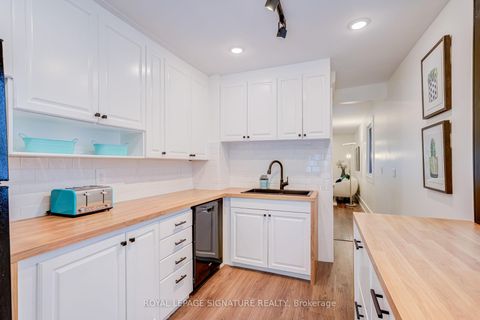 Photo 14 at 176 Barrington Avenue, Crescent Town, Toronto