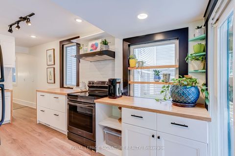 Photo 15 at 176 Barrington Avenue, Crescent Town, Toronto