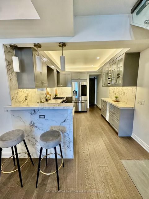 Photo 2 at 219 McRoberts Avenue, Davenport, Toronto