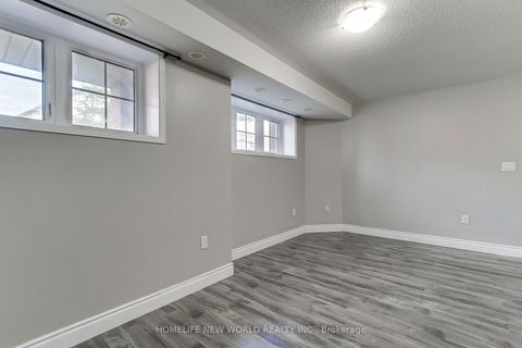 Photo 11 at 3 - 133 Isaac Devins Boulevard, Pelmo Park W5, Toronto