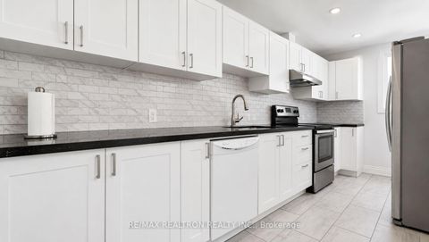 Photo 8 at 107 Kirker Avenue, Woburn, Toronto