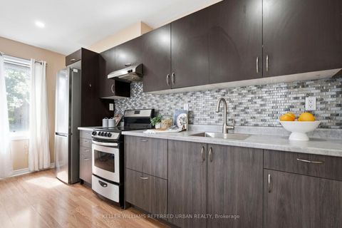 Photo 5 at 34 Lambrinos Lane, Jane Heights, Toronto