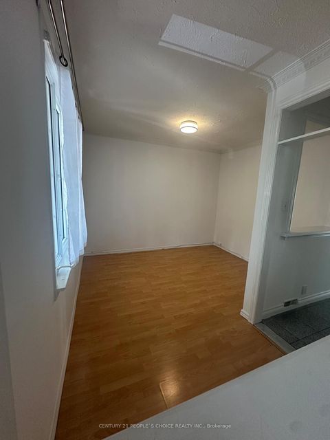 Photo 2 at 98 Chambers Avenue, Pellam Park, Toronto