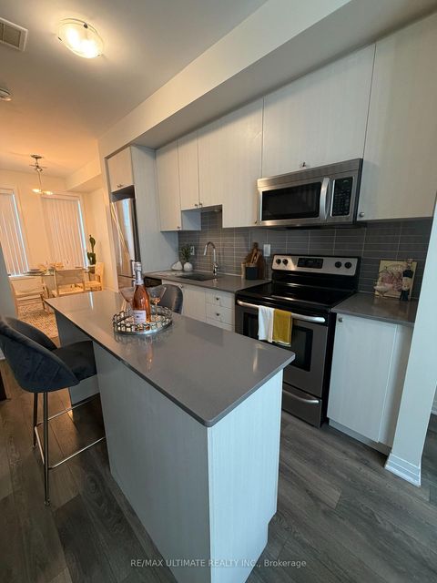 Photo 1 at 4 - 45 Thomas Mulholland Drive, CFB, Toronto