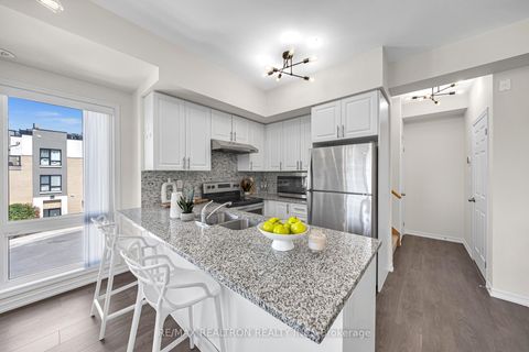 Photo 2 at 328 - 510 Kingbird Grove, Rouge E11, Toronto