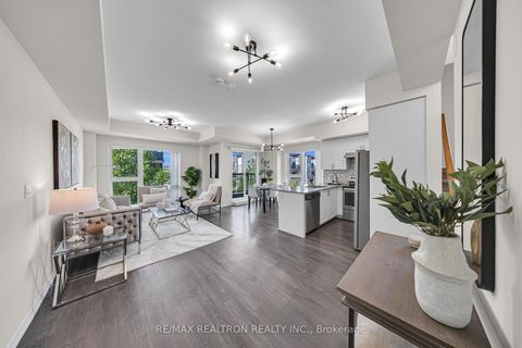 Photo 5 at 328 - 510 Kingbird Grove, Rouge E11, Toronto