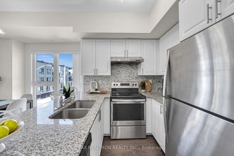 Photo 7 at 328 - 510 Kingbird Grove, Rouge E11, Toronto