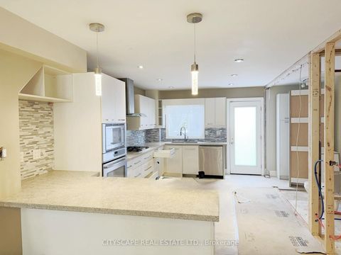 Photo 10 at 817 Cosburn Avenue, East York, Toronto