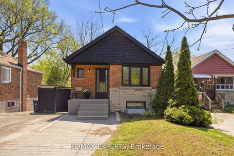 Photo 0 at 221 Clonmore Drive, Cliffside, Toronto