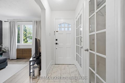 Photo 1 at 221 Clonmore Drive, Cliffside, Toronto