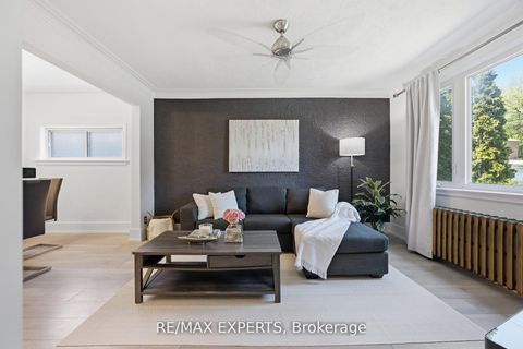 Photo 2 at 221 Clonmore Drive, Cliffside, Toronto