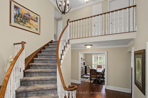 Photo 1 at 23 Cranberry Lane, Aurora Highlands, Aurora