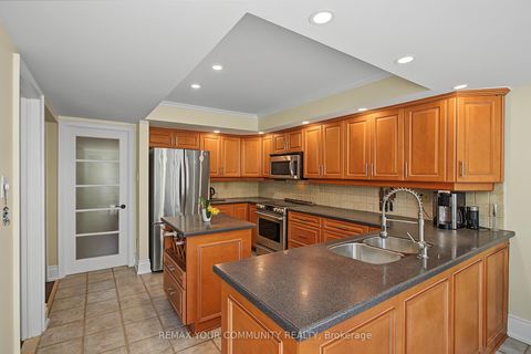 Photo 10 at 23 Cranberry Lane, Aurora Highlands, Aurora