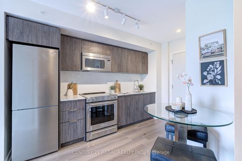 Photo 4 at 412 - 30 Samuel Wood Way, City Centre West, Toronto
