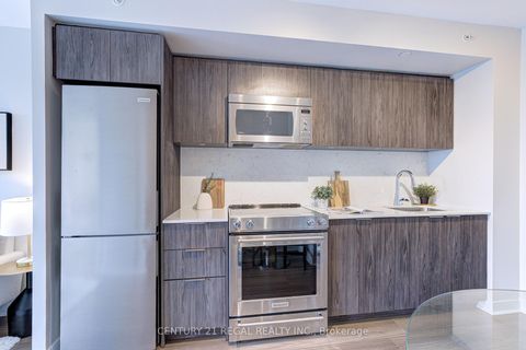 Photo 6 at 412 - 30 Samuel Wood Way, City Centre West, Toronto