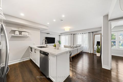 Photo 3 at 5 - 161 Isaac Devins Boulevard, Pelmo Park W5, Toronto