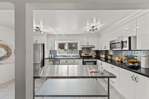 Photo 17 at 62 - 109 Jenny Wren Way, Hillcrest Village, Toronto