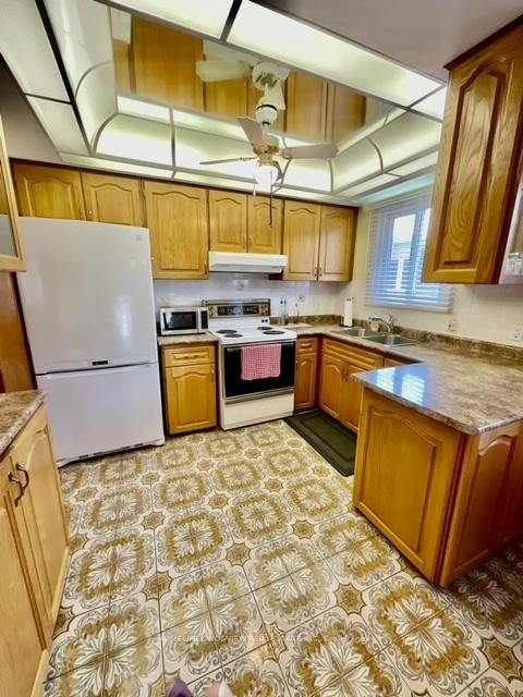 Photo 12 at 51 Seacliffe Boulevard, Humber Summit, Toronto